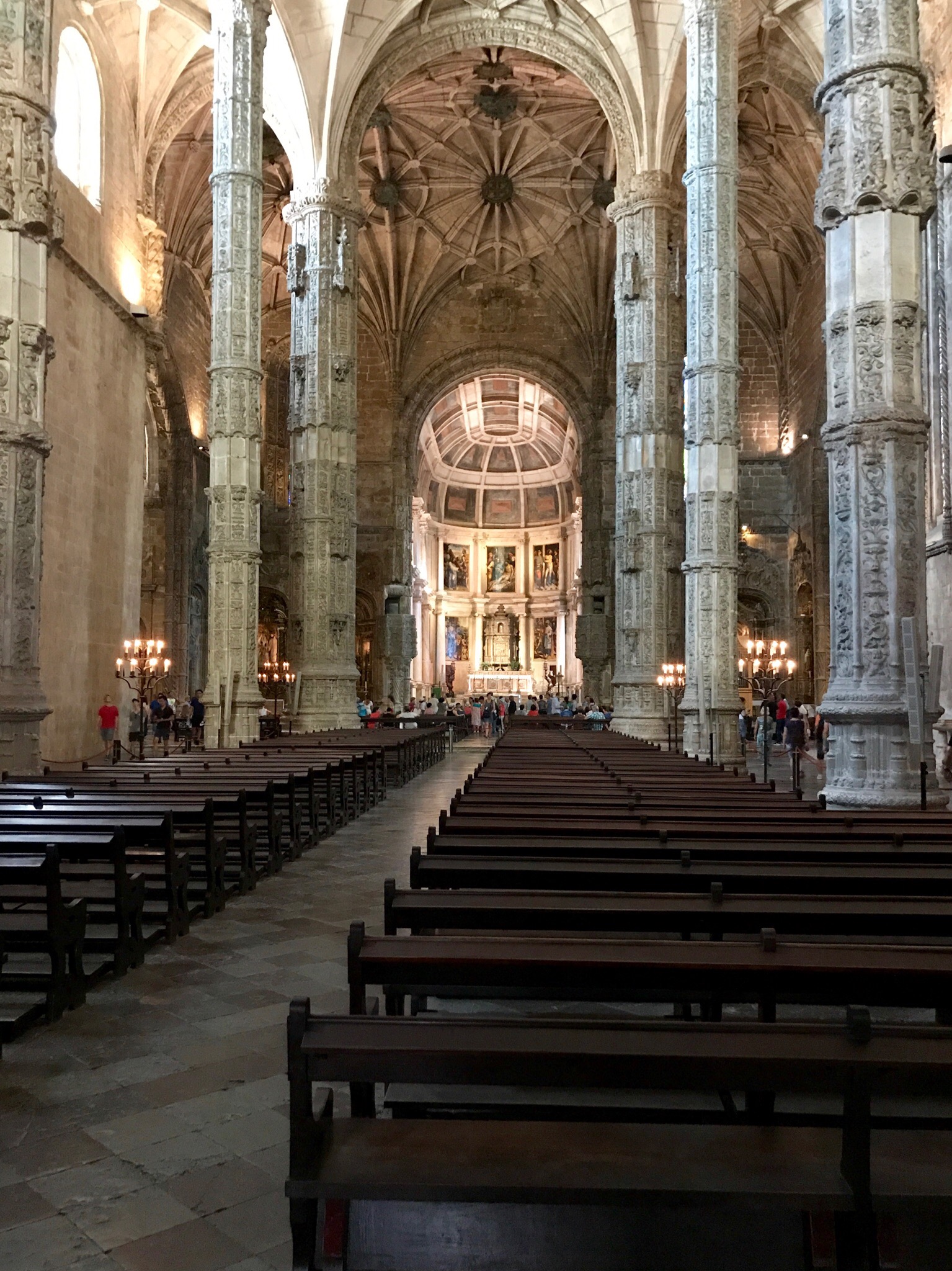 The vaulted nave of the monastery church in Belém, chairs set out in rows down its length