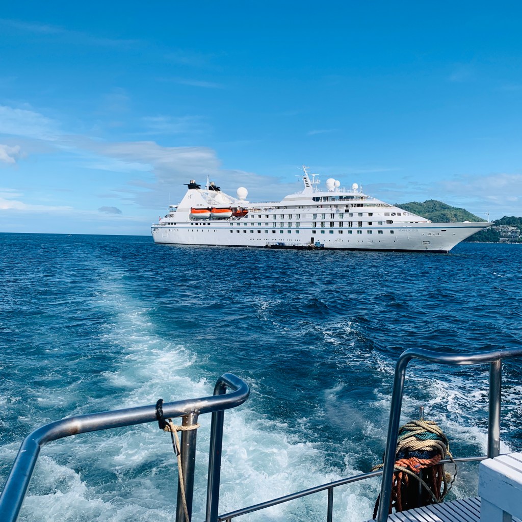 Looking back at the Star Legend from the tender, her wake spreading behind