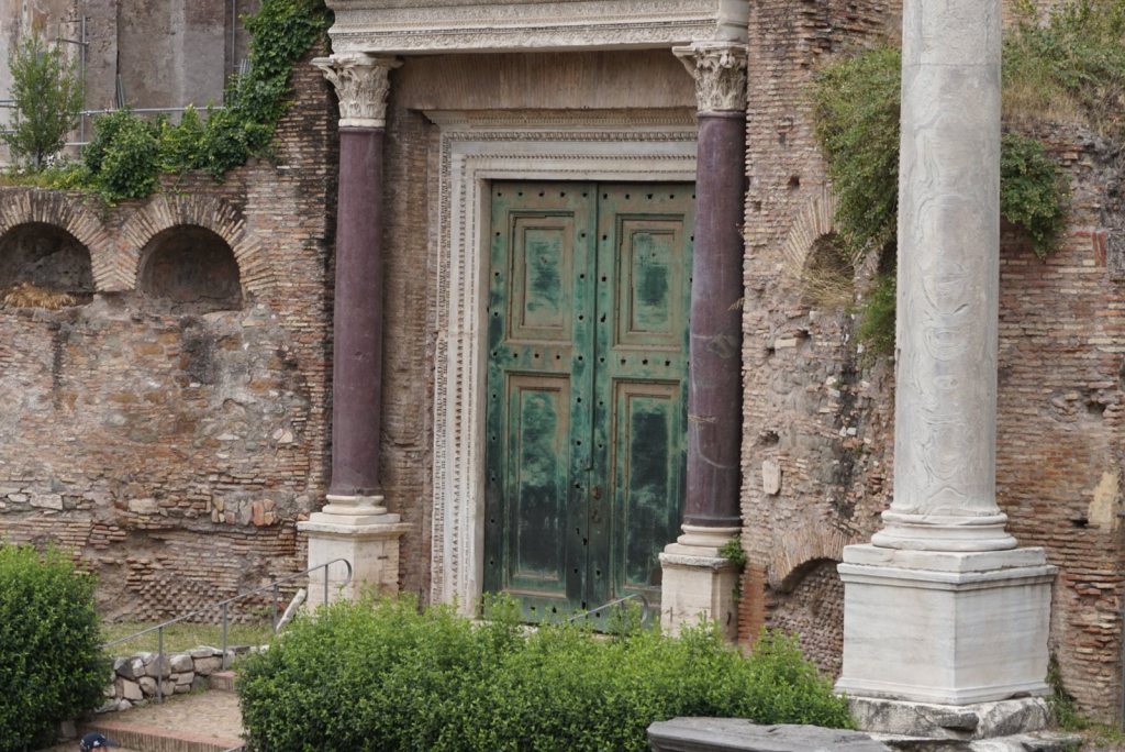 The green bronze doors of the Temple of Romulus set between two porphyry columns
