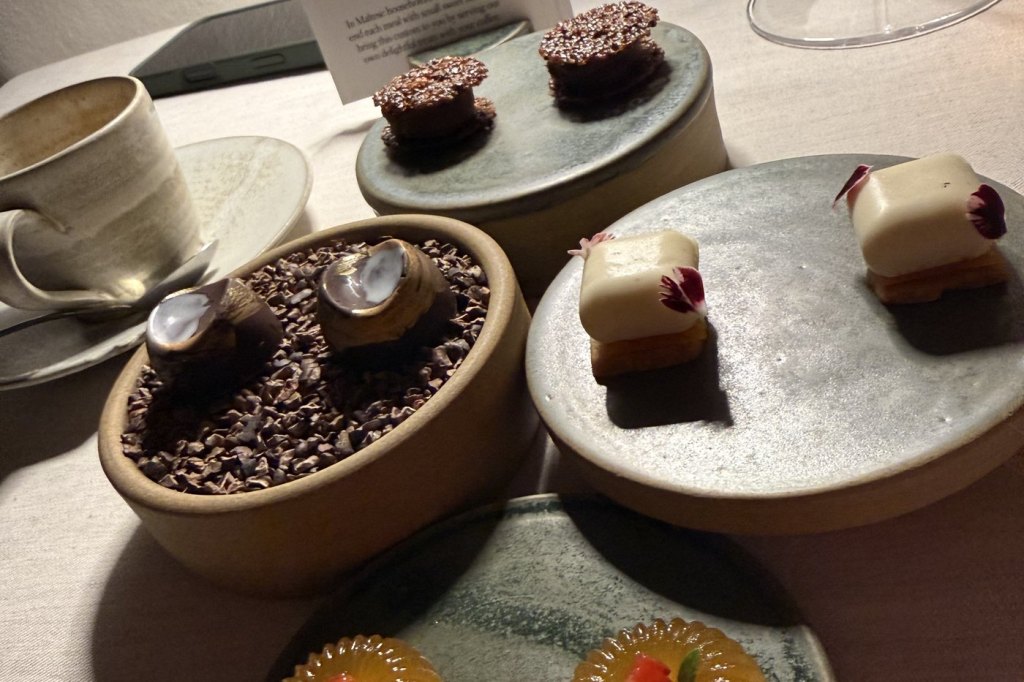 Petit fours on ceramic pedestals at Noni in Valletta — the last photograph taken on the trip.